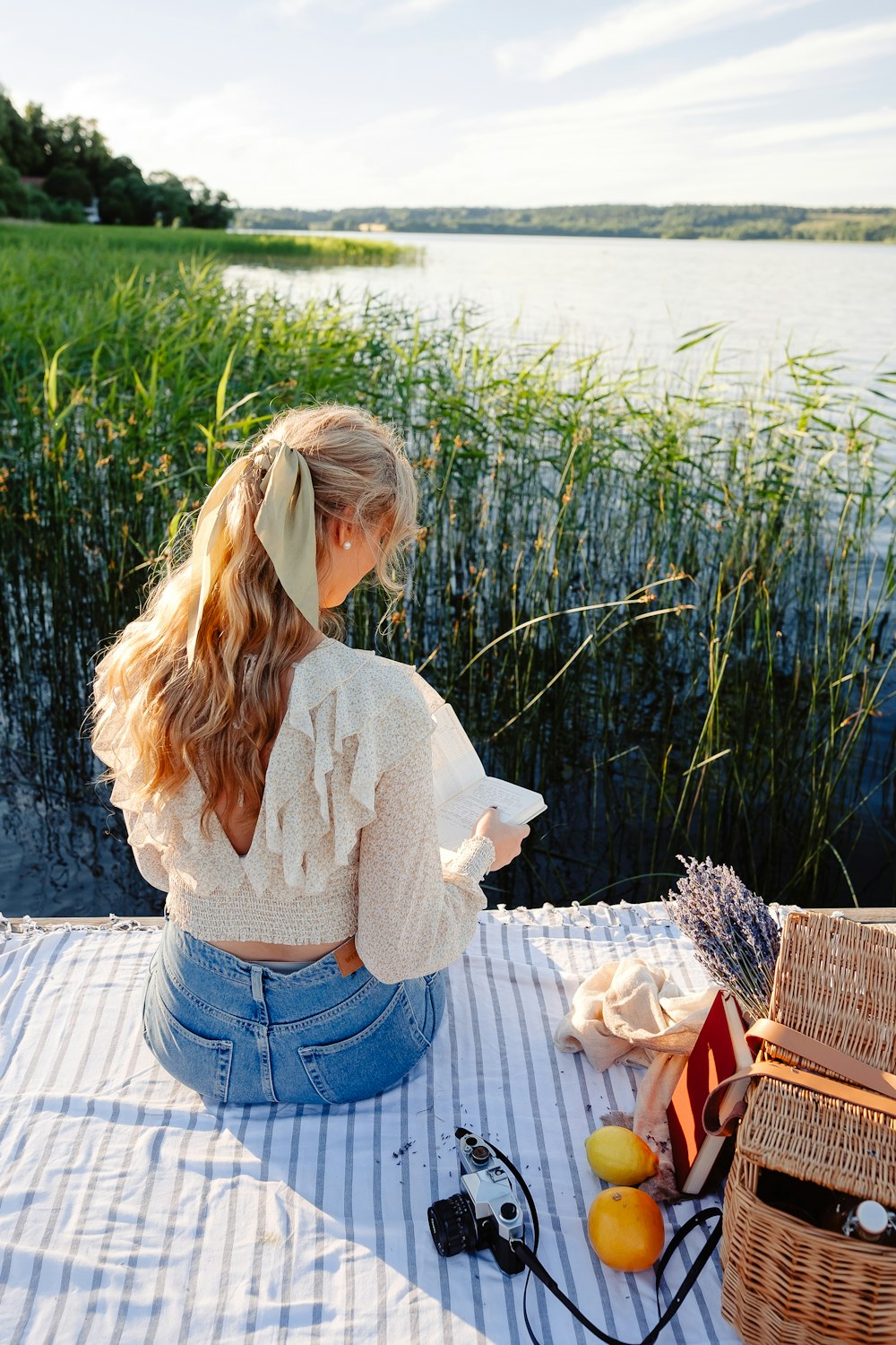 a person sitting on a picnic table