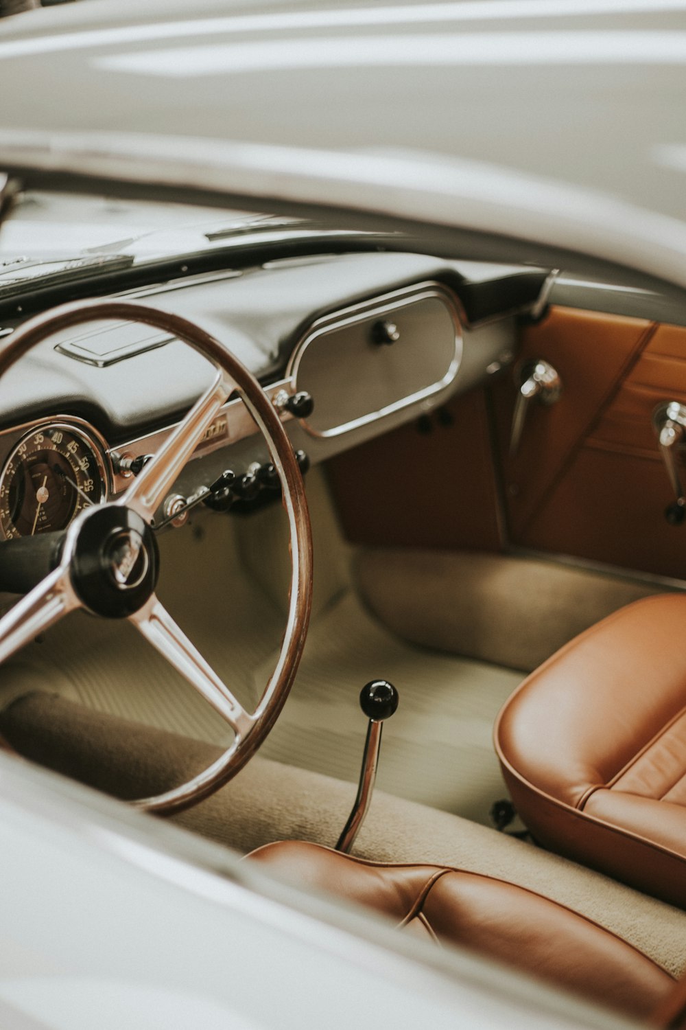 a steering wheel and dashboard of a car