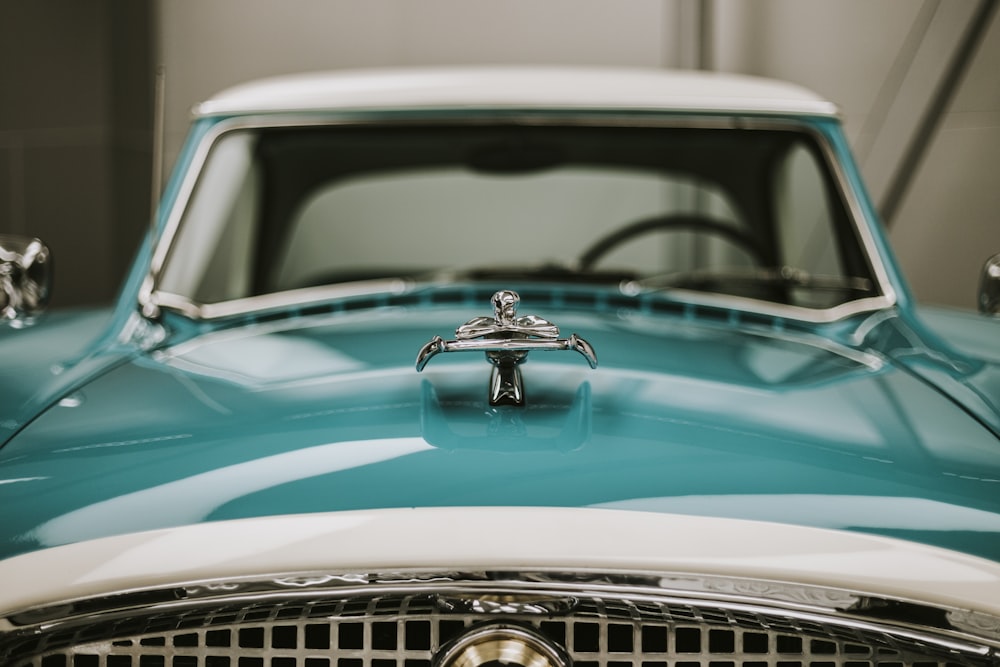 a blue car with a key on the front