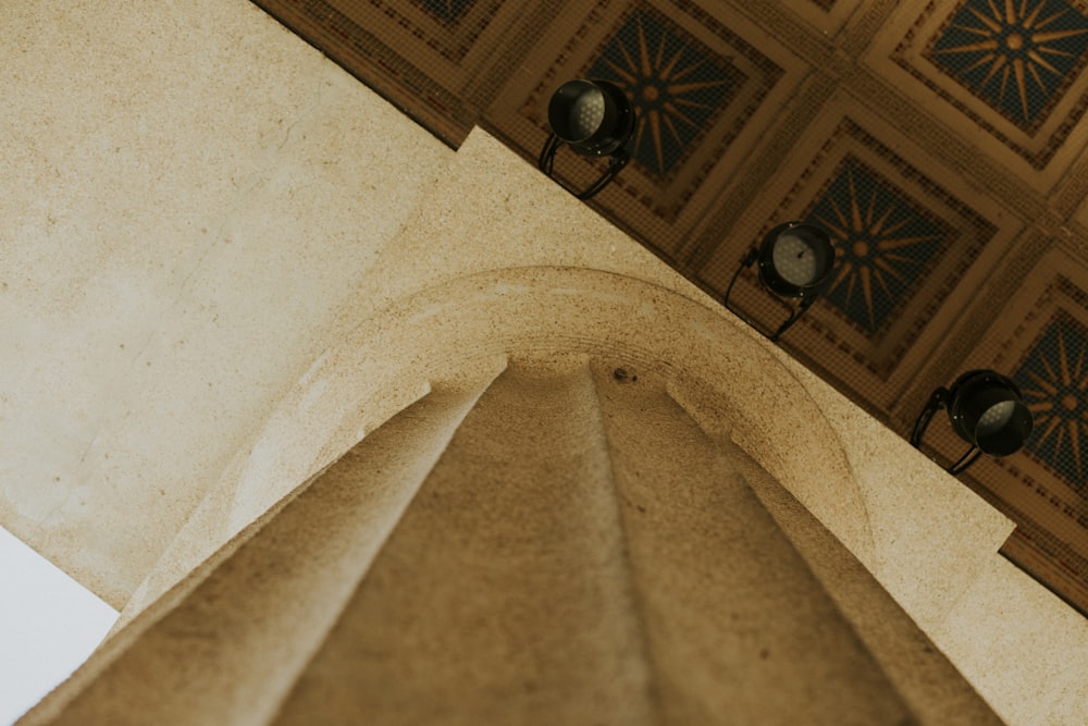 a ceiling with a tile floor