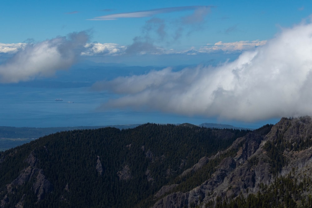 a mountain with clouds