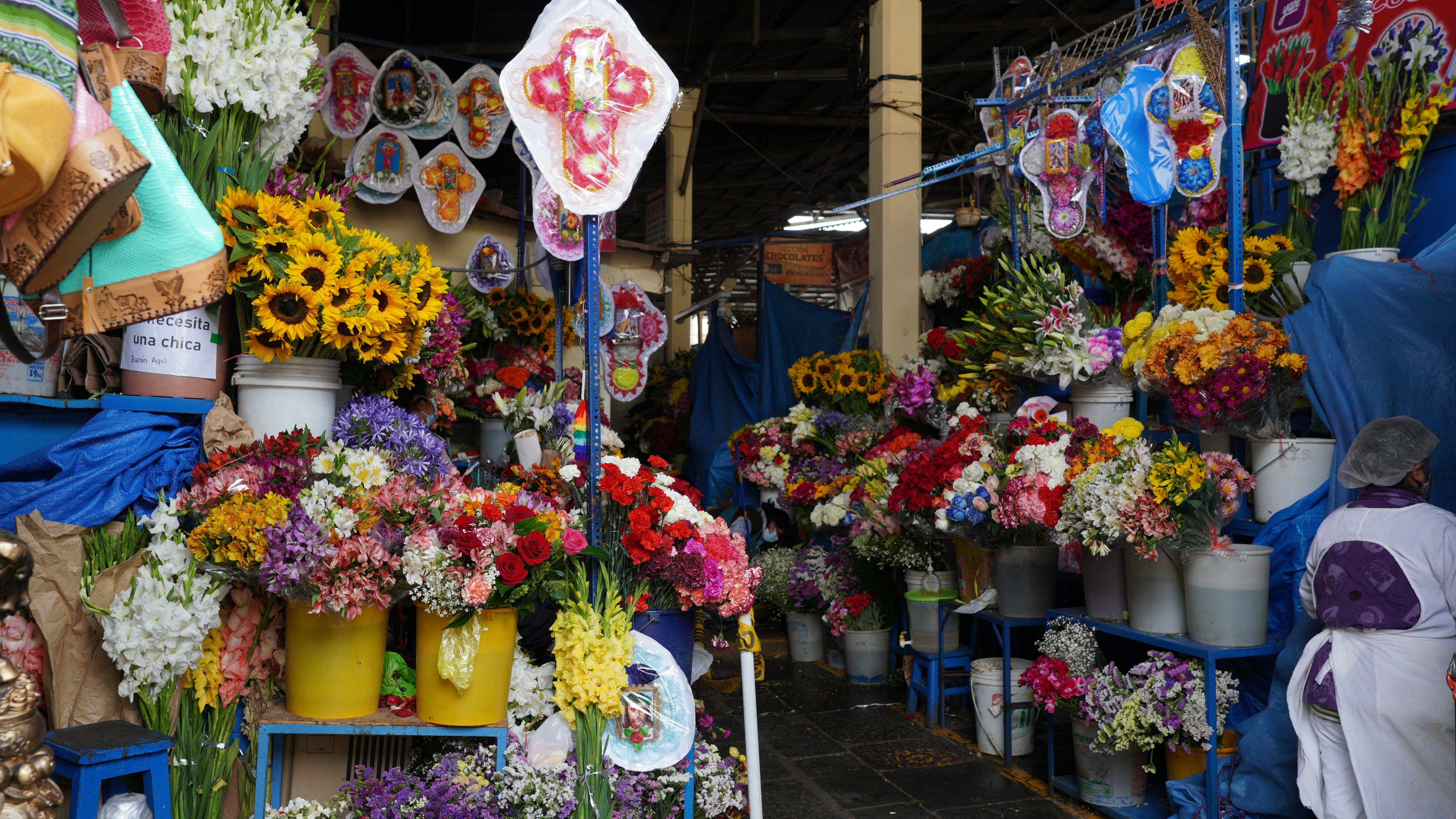 a group of flowers in a market