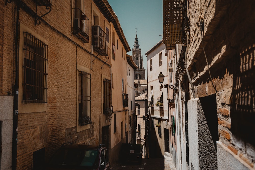 a narrow street with buildings on both sides