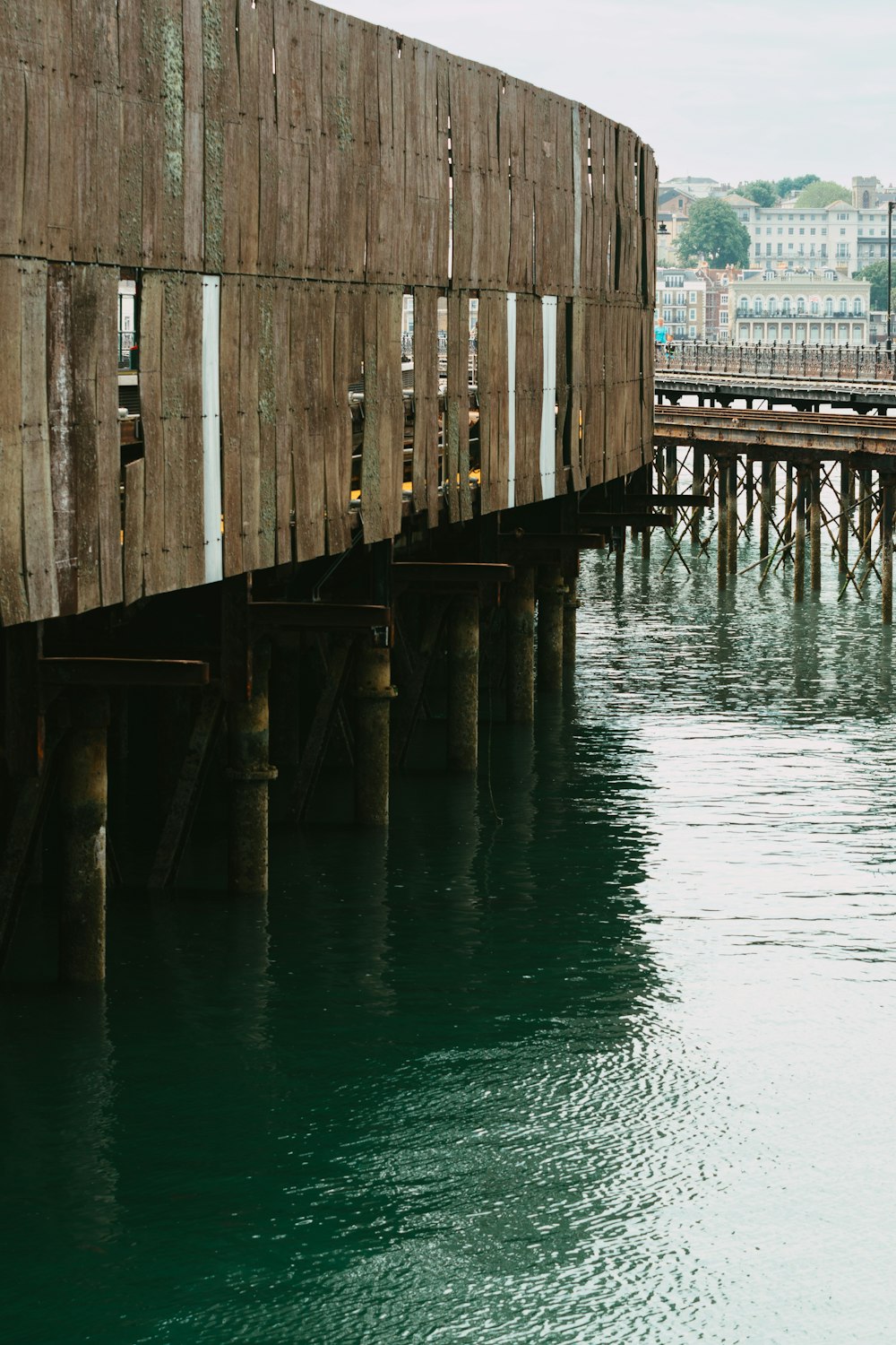 a wooden bridge over water