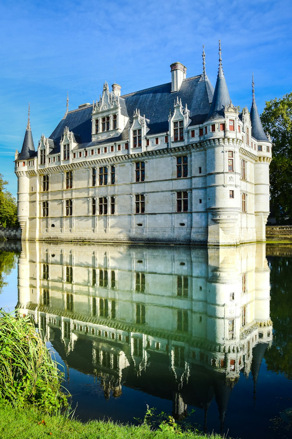 a large building with a moat