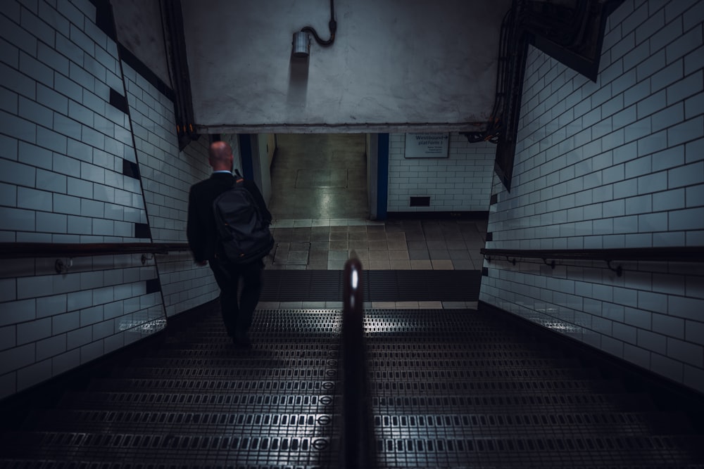 a person walking down a hallway