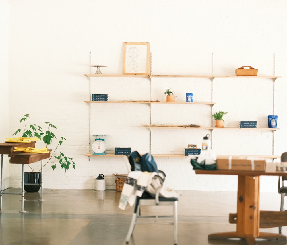 a room with shelves and a table