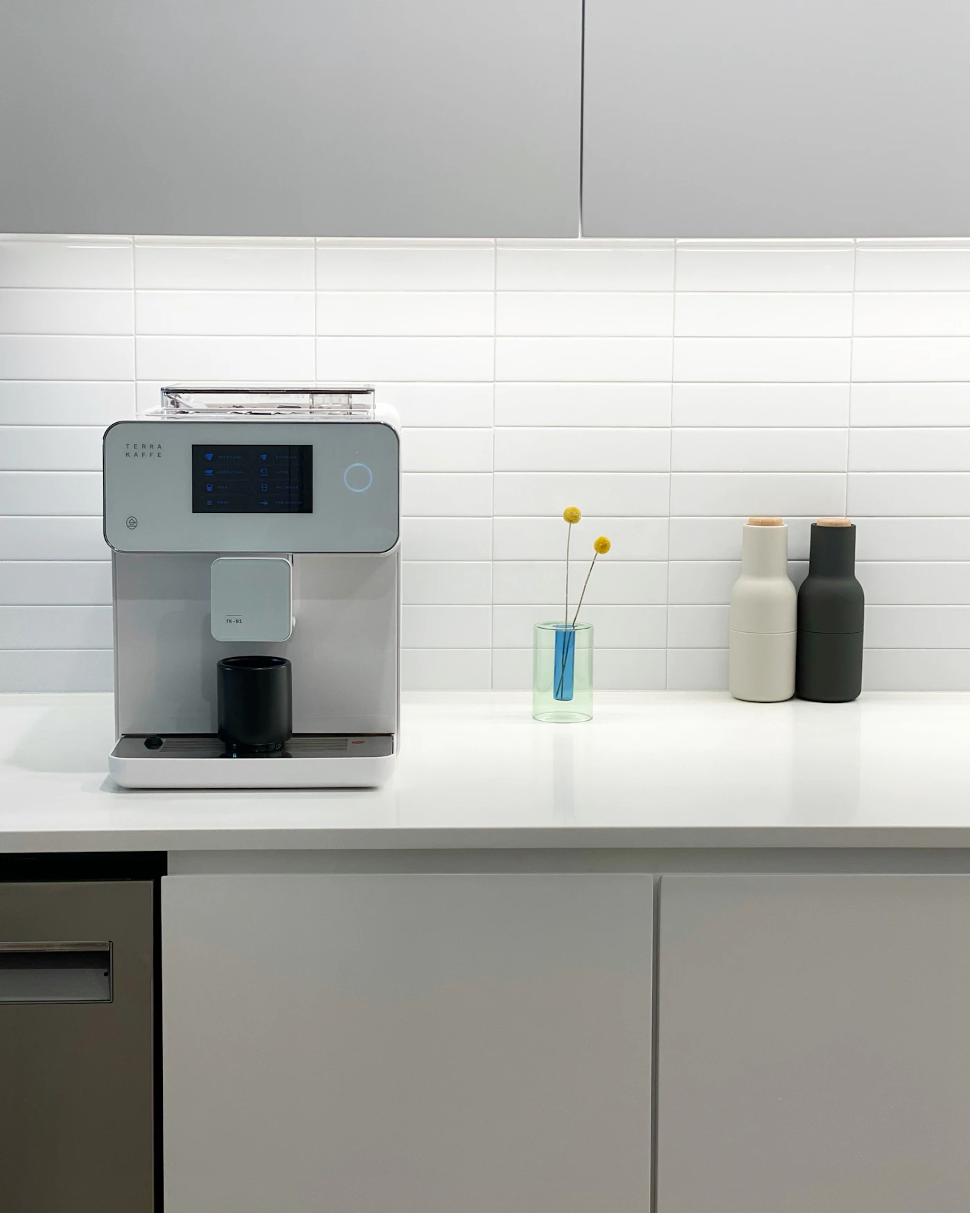 Small kitchen counter with open shelving above