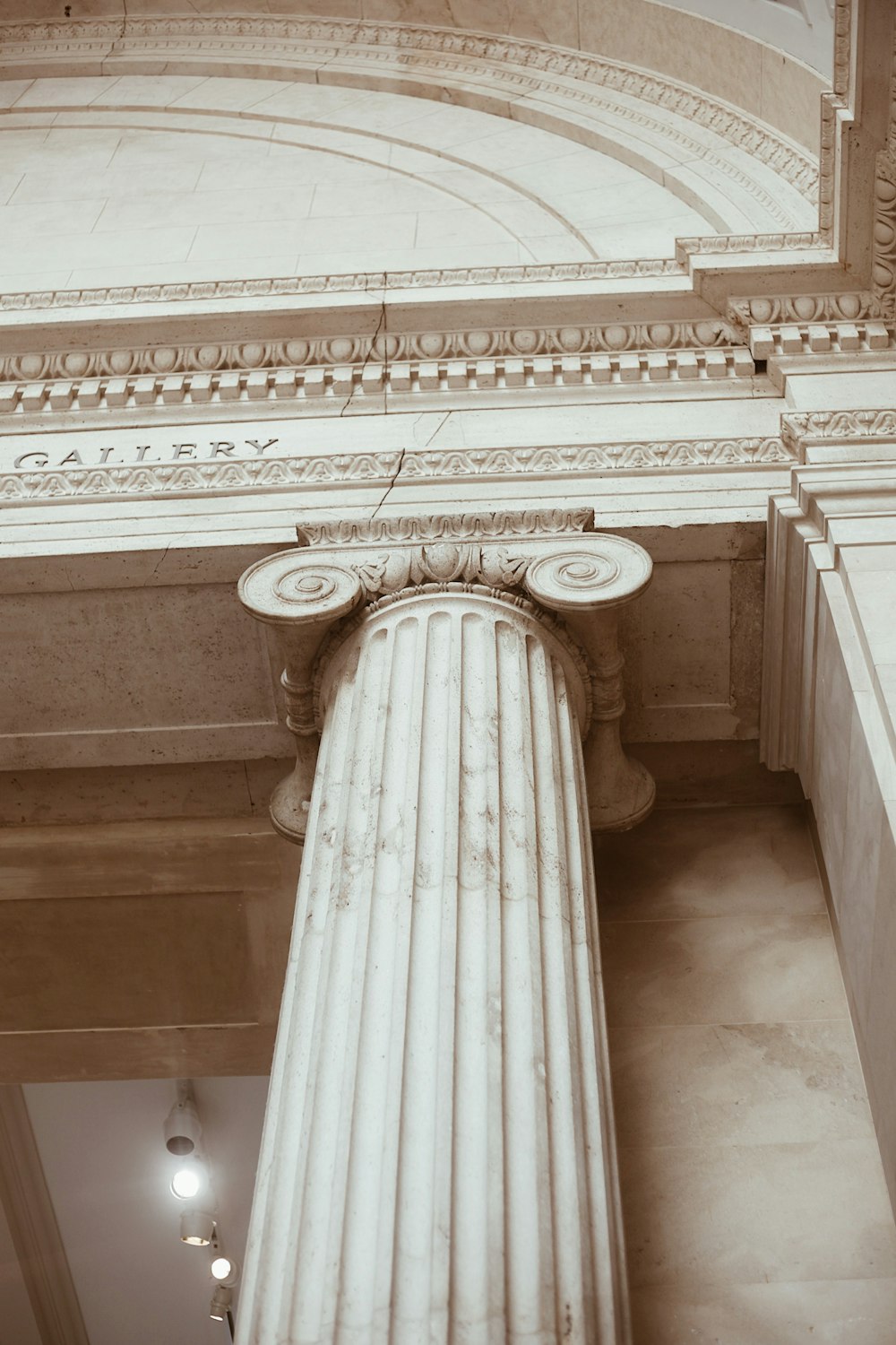 a pillar with carvings on it