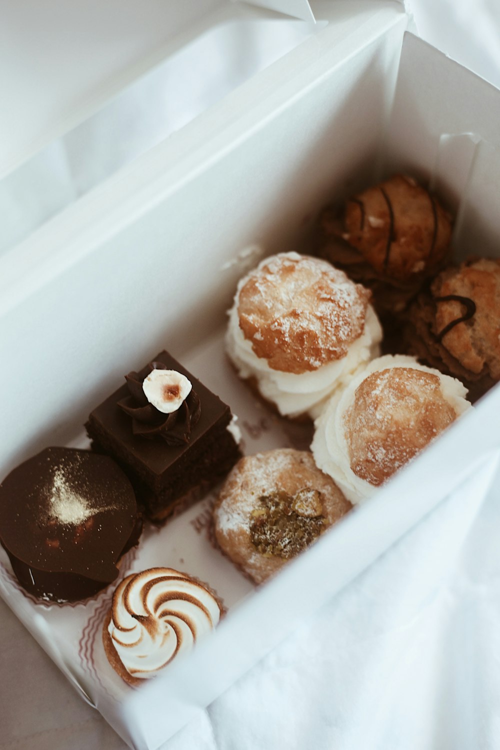 a box of chocolate cupcakes