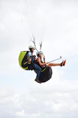 a couple of people parachuting