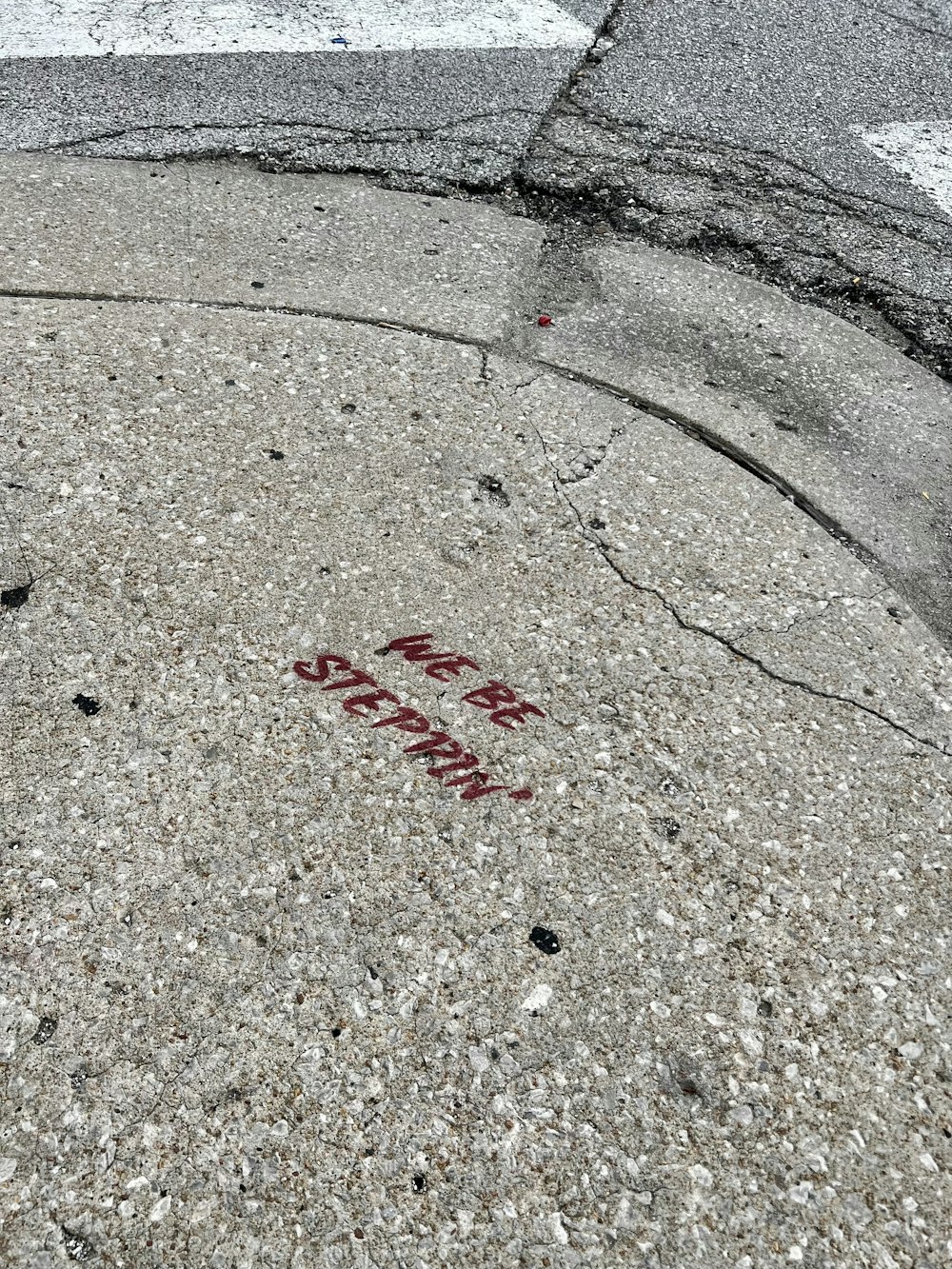 a sidewalk with a drawing on it