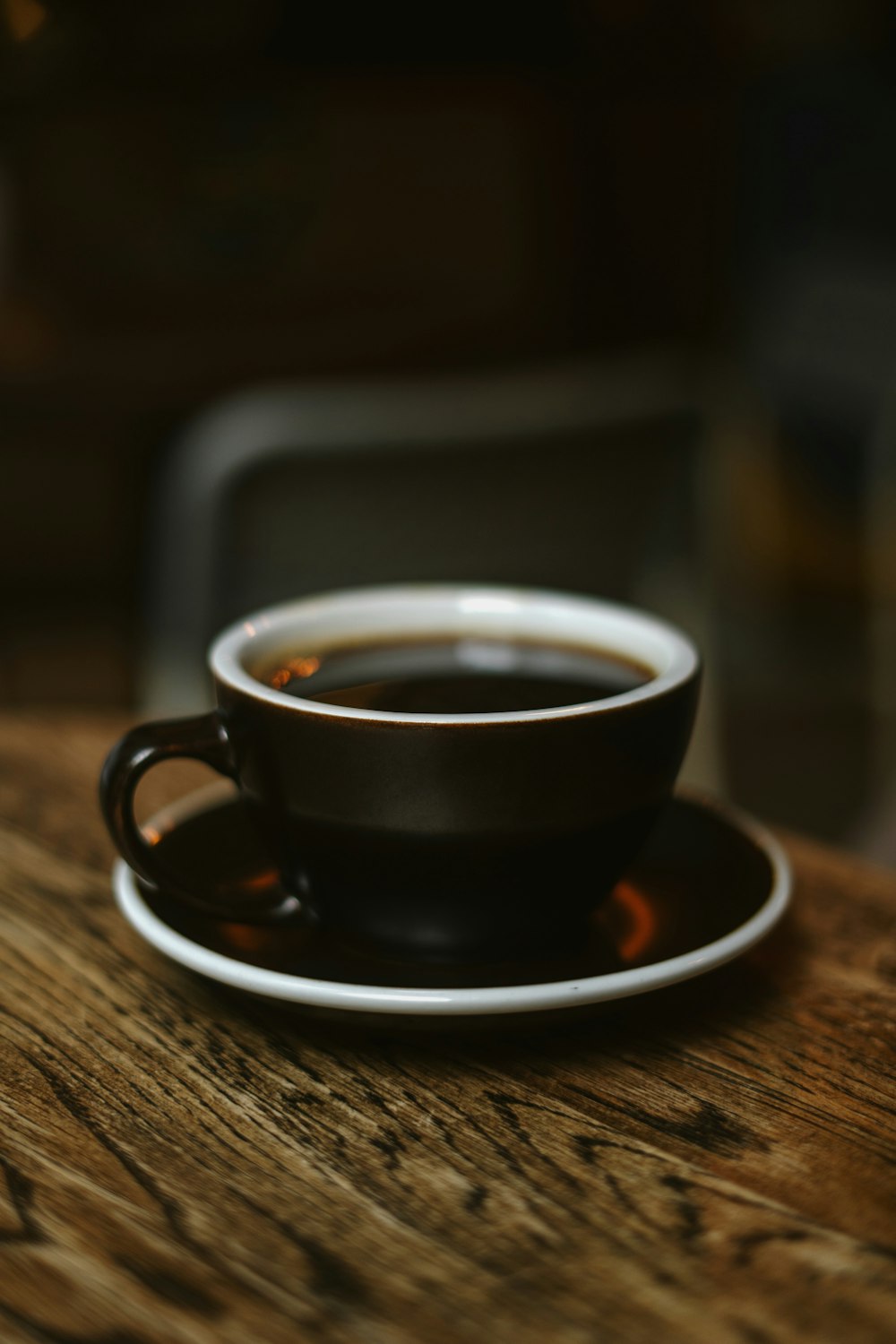 a cup of coffee on a saucer