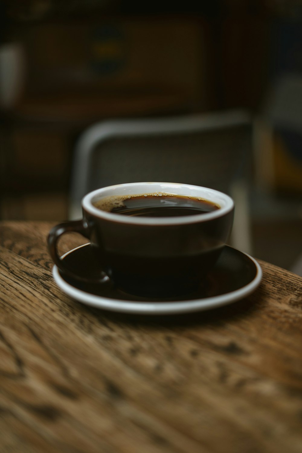 a cup of coffee on a saucer