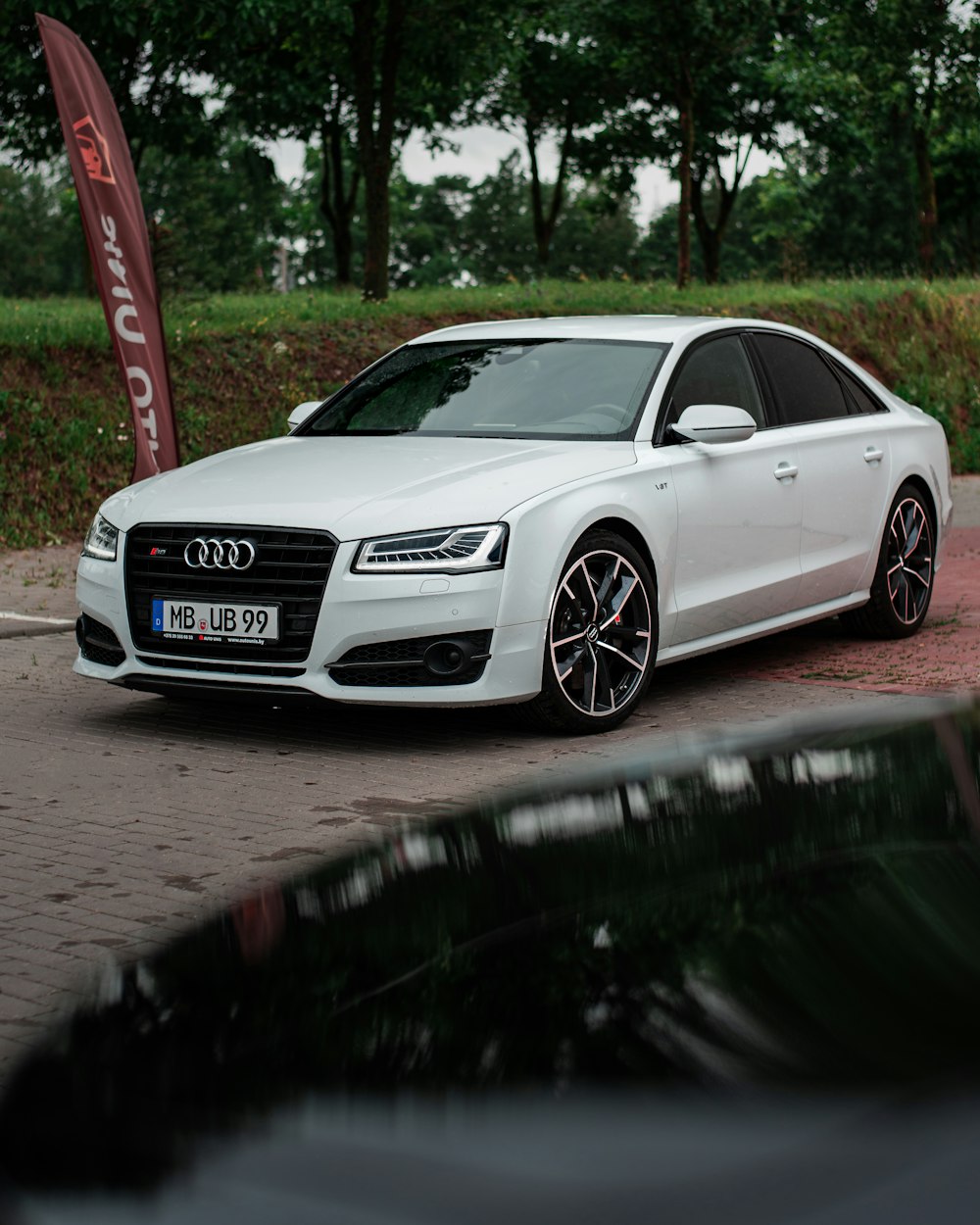 a white car parked on a road