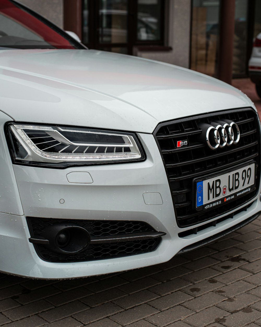 the front of a white car