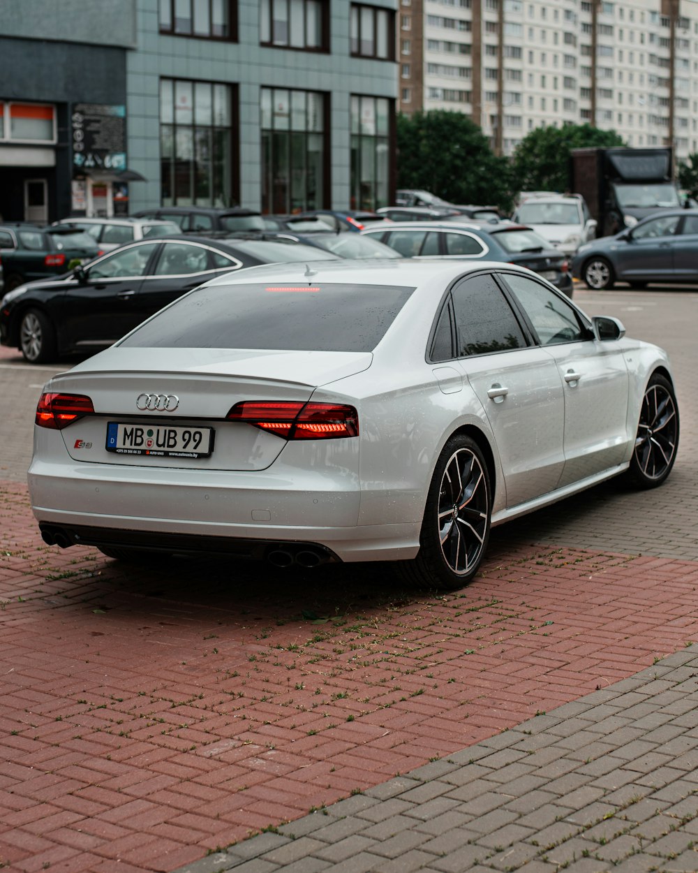 a white car parked in a parking lot