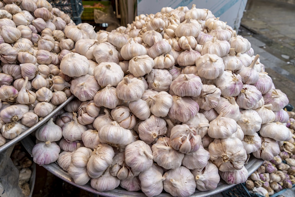 a pile of white and pink mushrooms