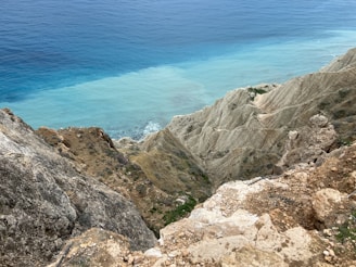 a rocky cliff overlooking the ocean