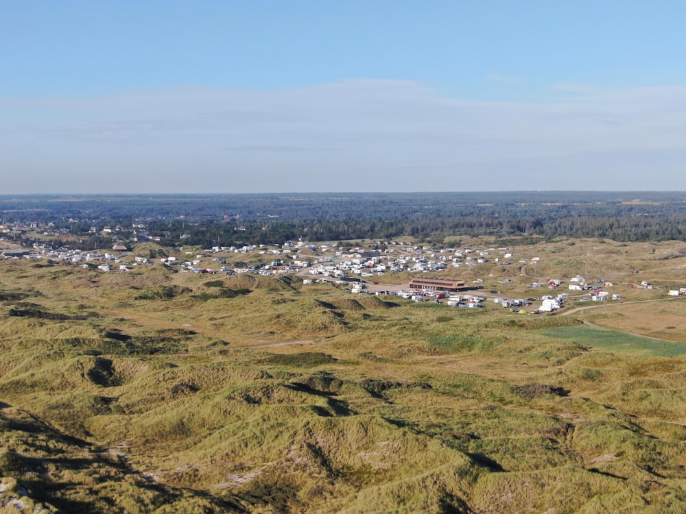 a landscape with houses and trees