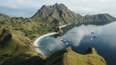 a body of water surrounded by mountains