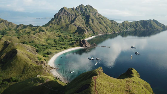 a body of water surrounded by mountains