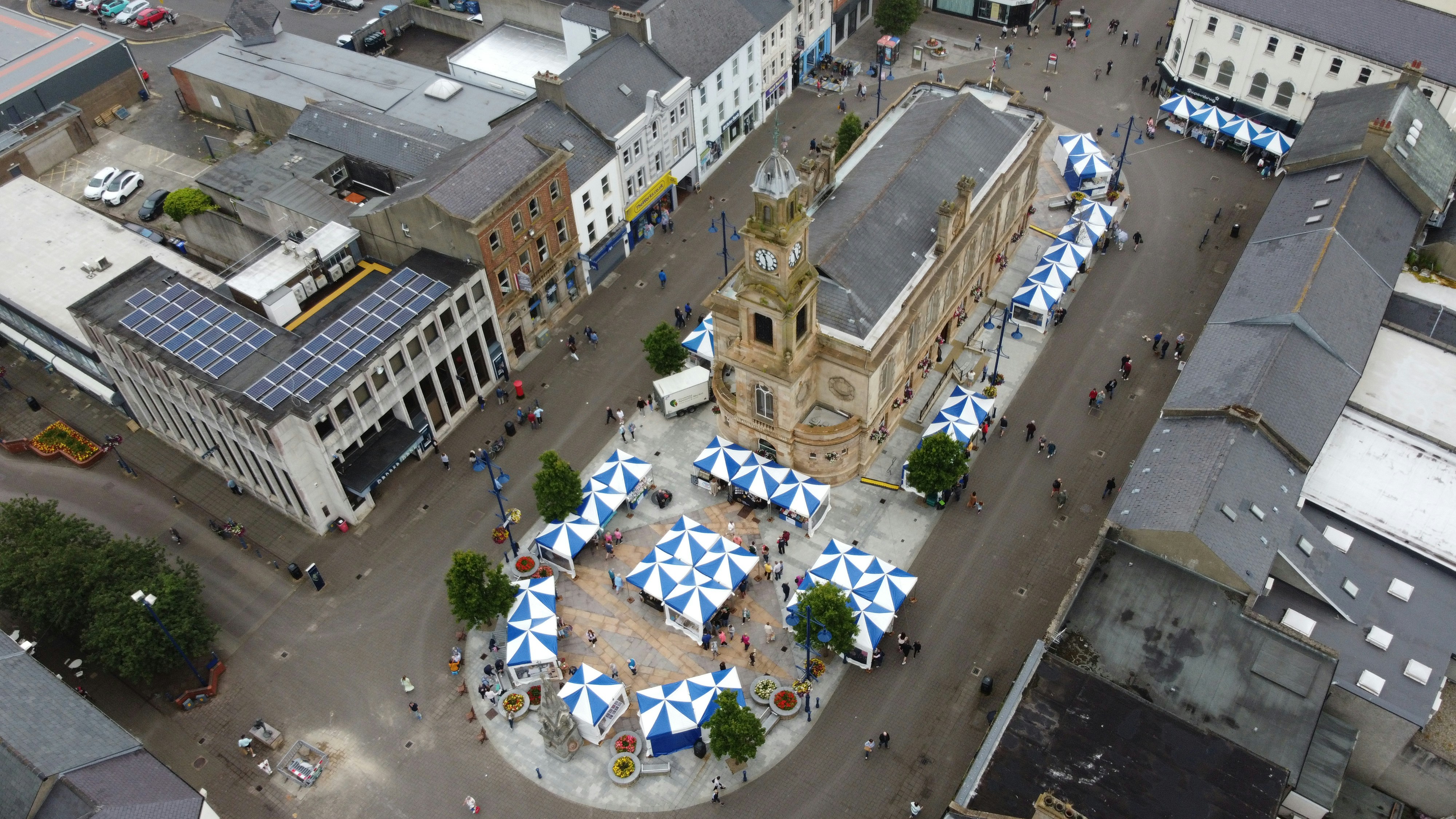 a group of buildings with a clock tower