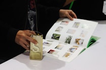 a person holding a can