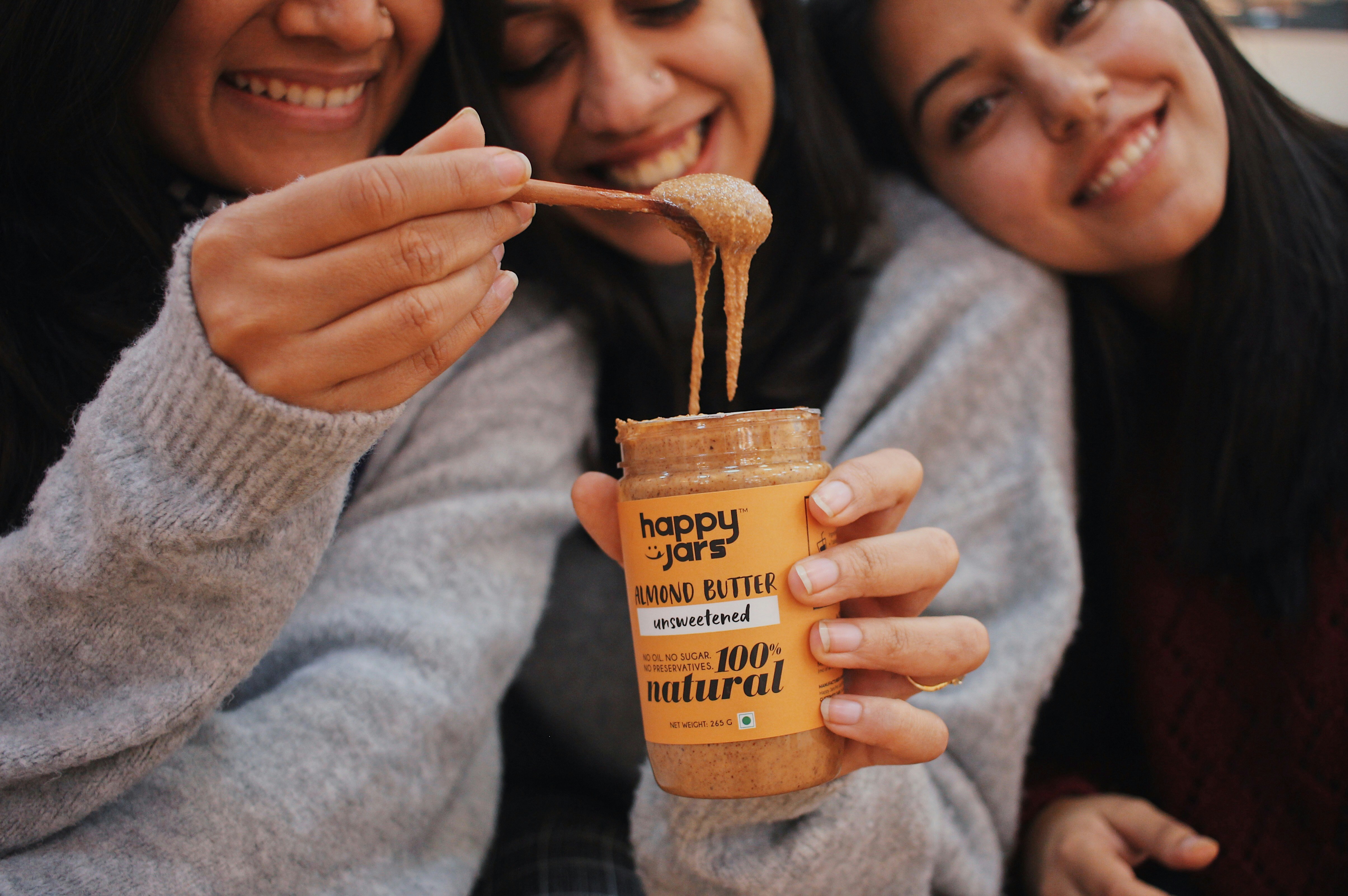 a group of people eating ice cream