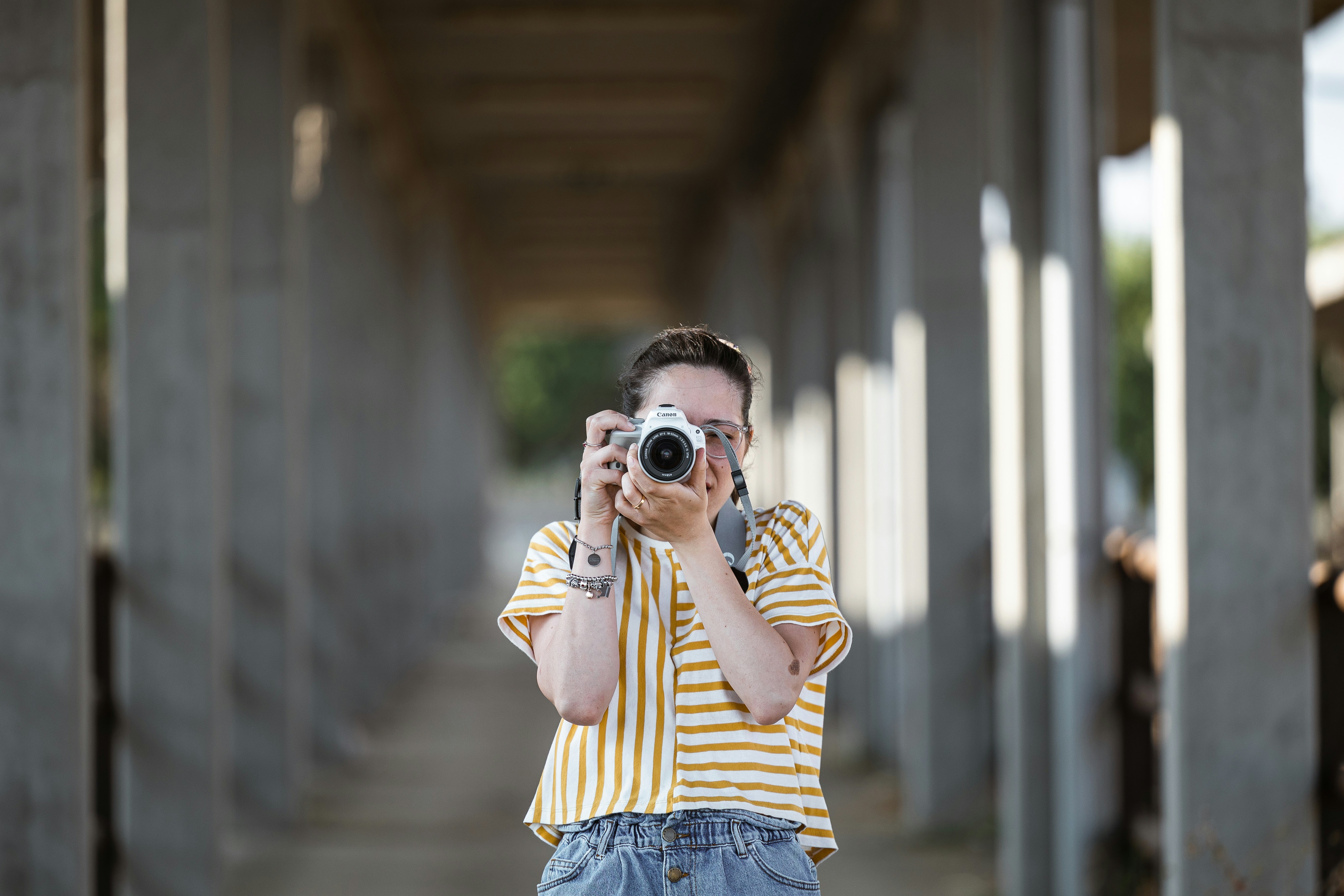 a person holding a camera