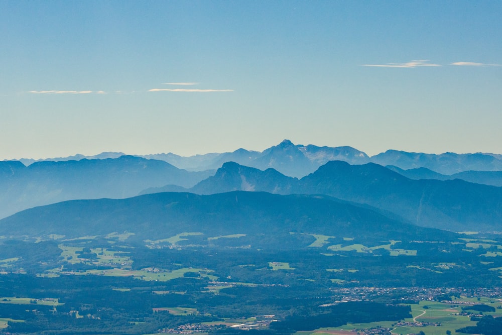 a city in front of a mountain range