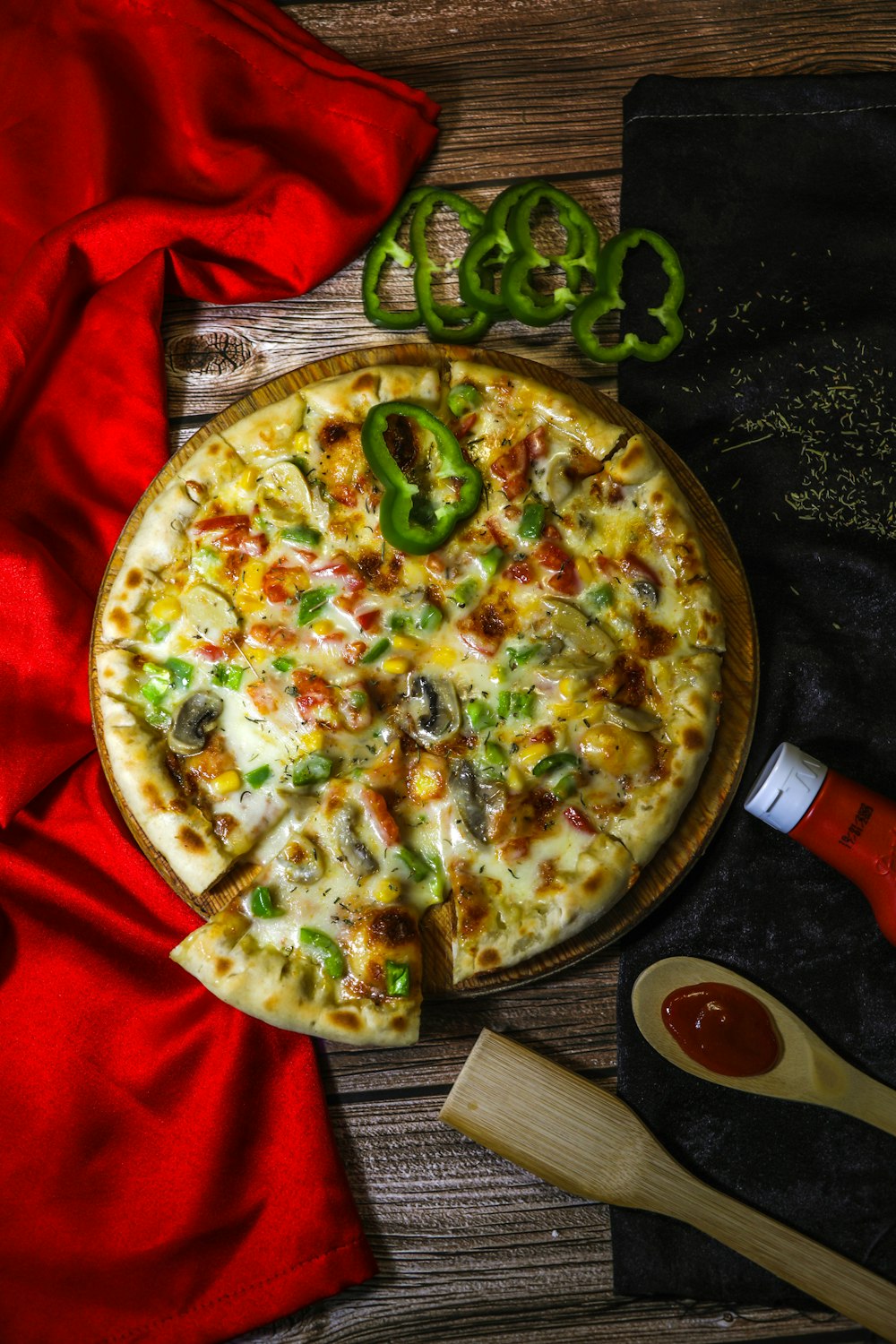 a pizza with peppers and cheese