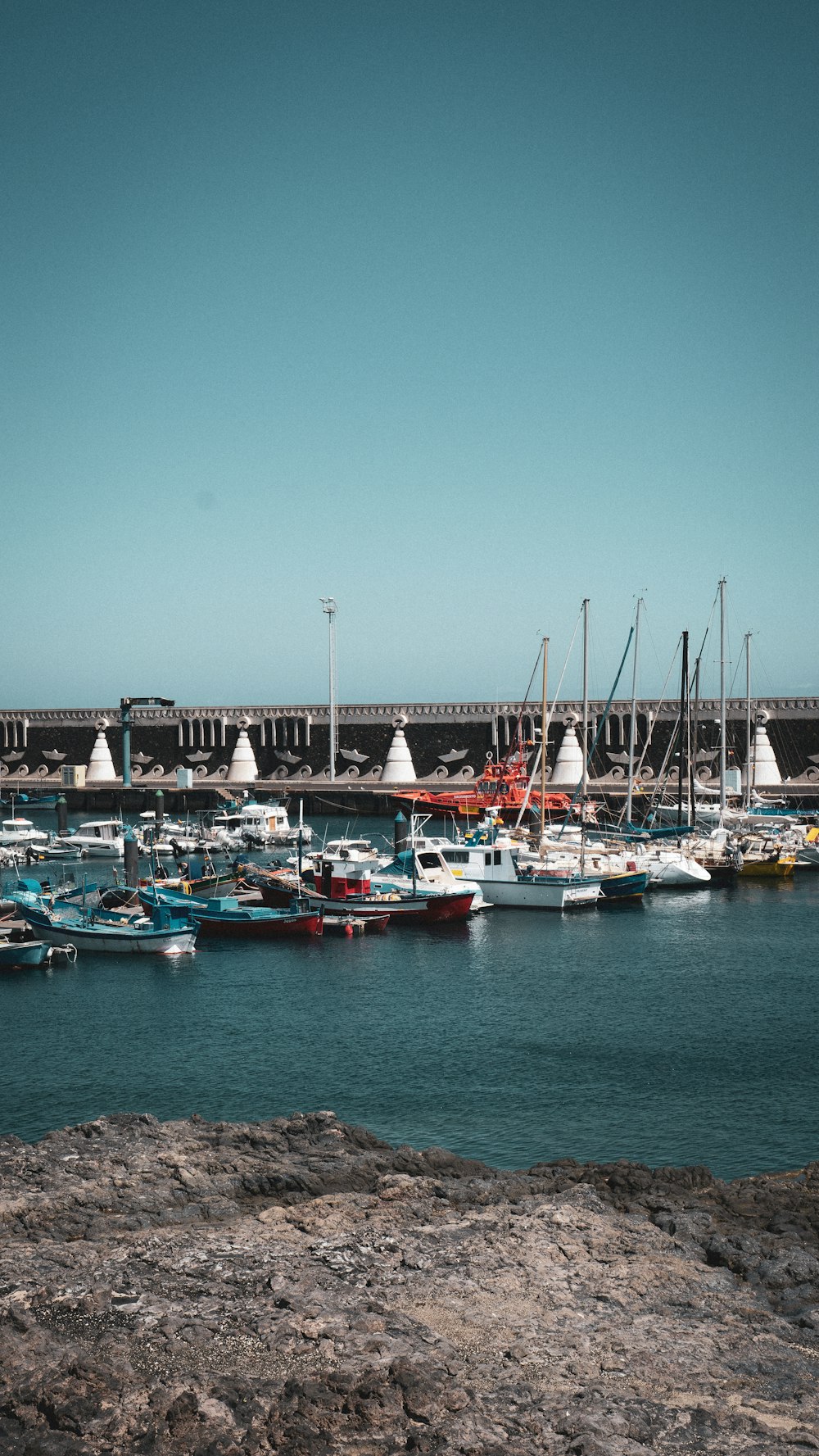 a group of boats in a harbor