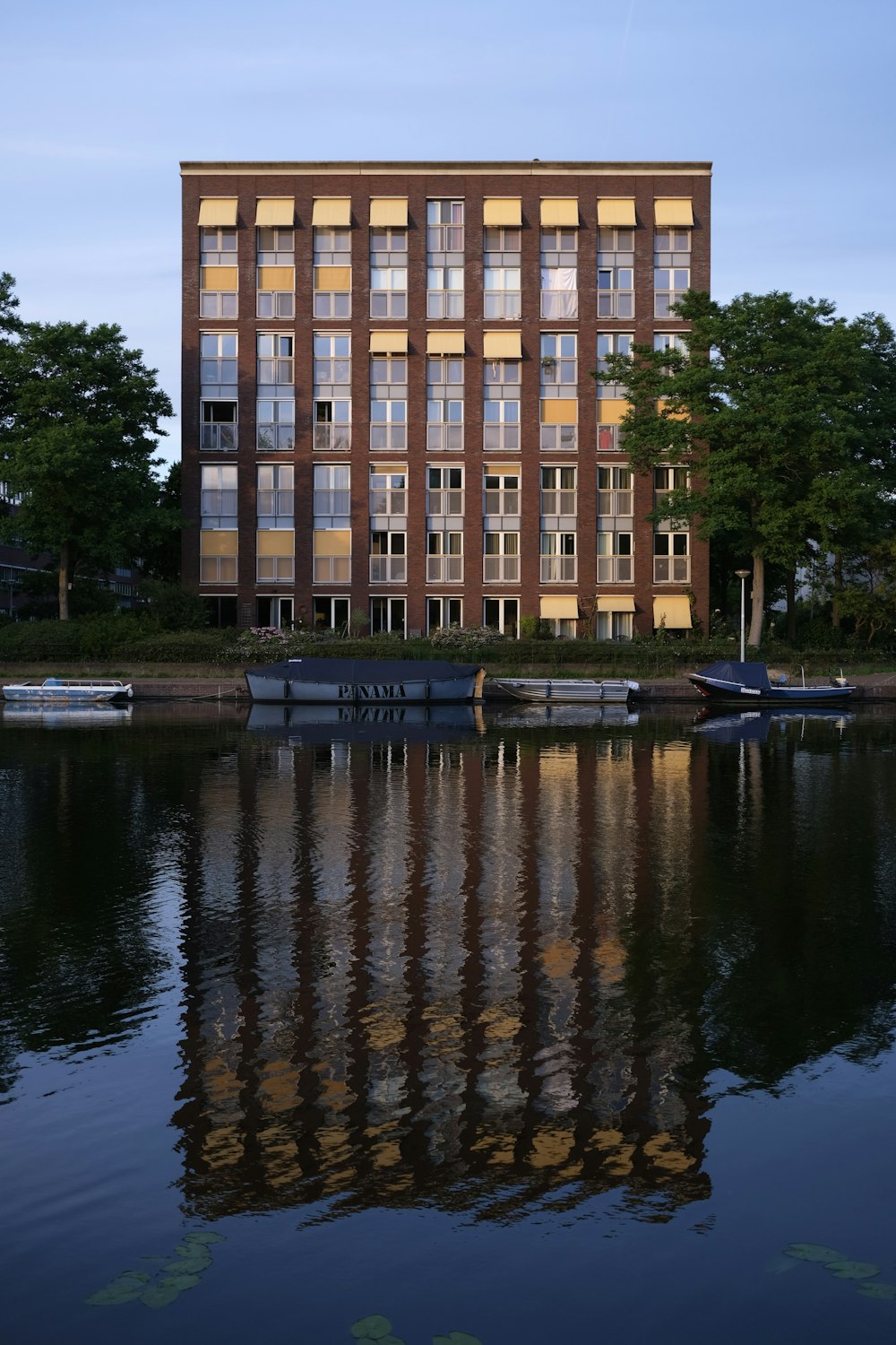 a building with a boat in the water