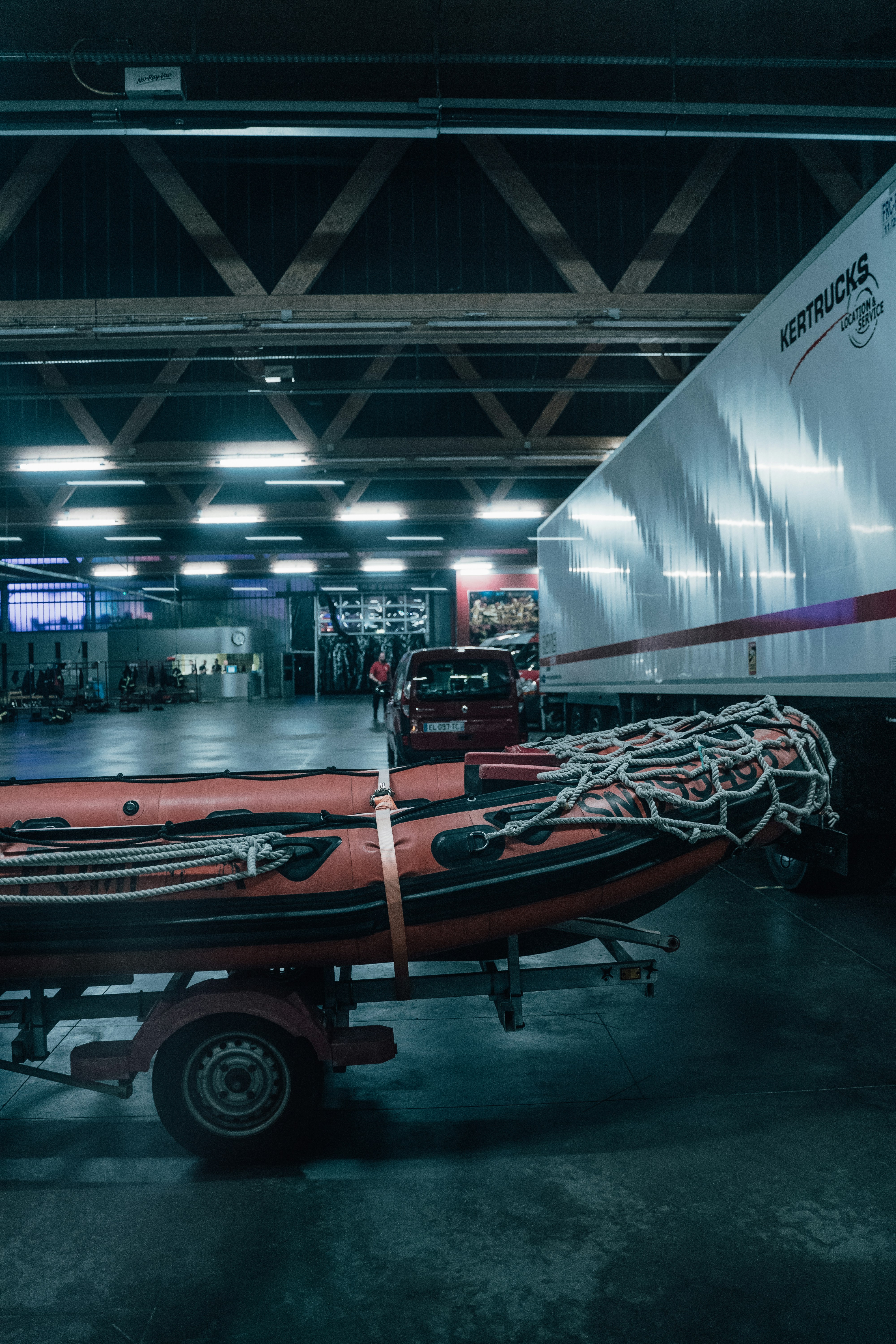 a trailer with a large white object on it