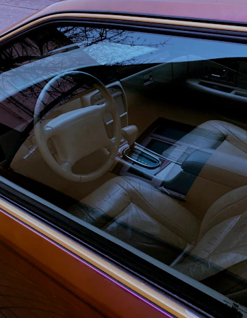 Interior dashboard and seats looking spotless and refreshed after detailing.