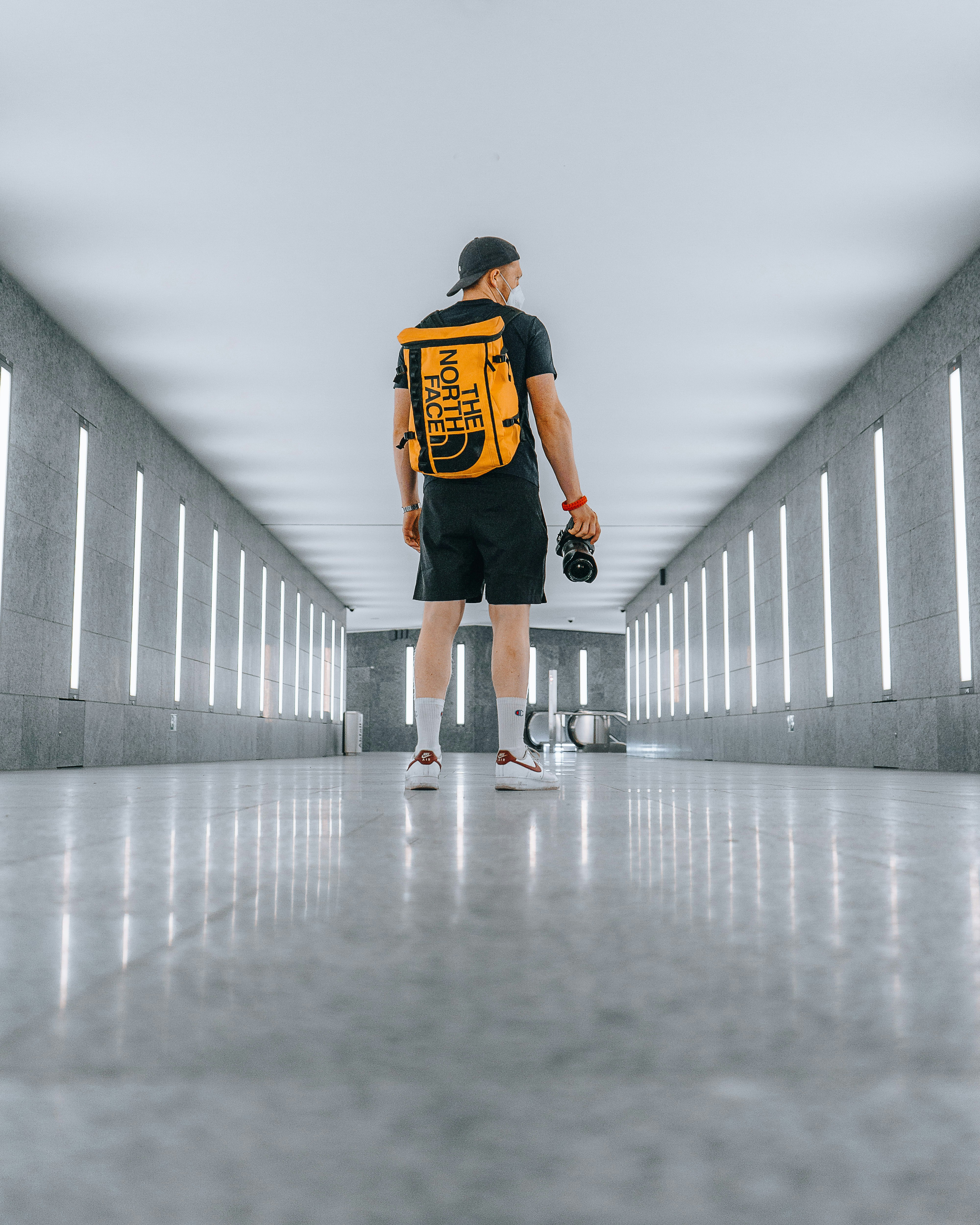 a person wearing a backpack and roller skates