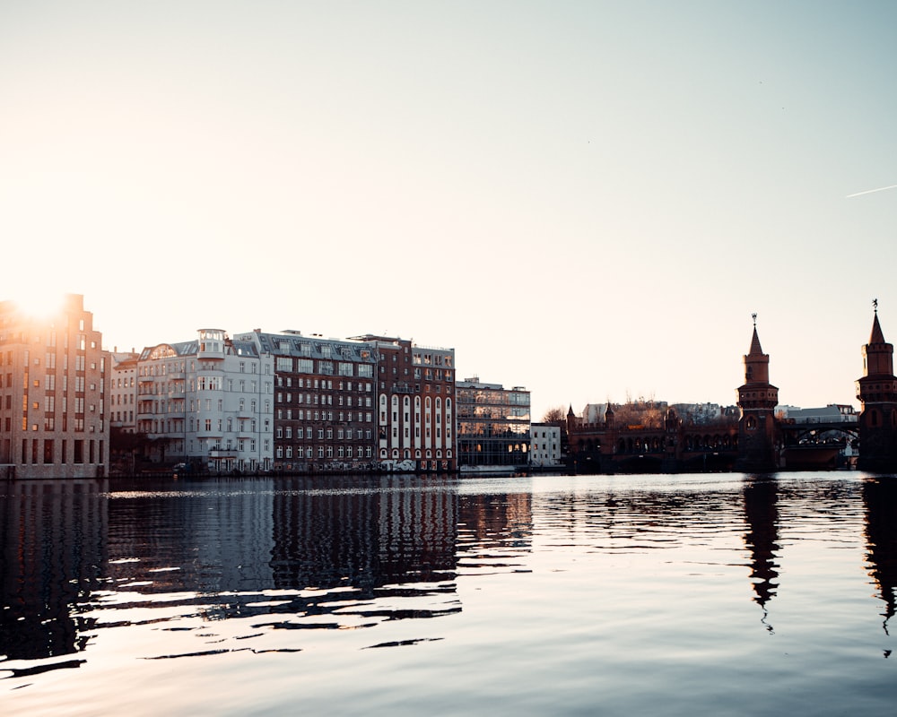 a body of water with buildings along it