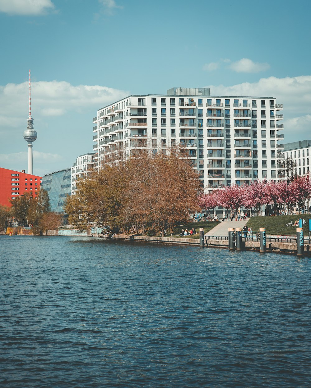 a body of water with buildings along it