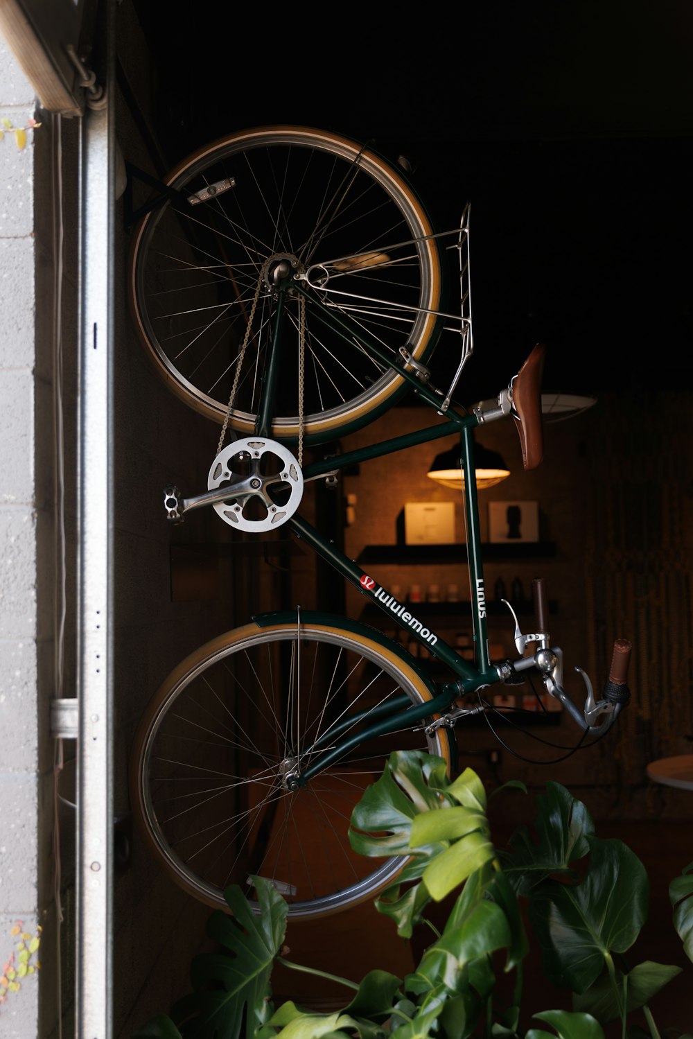 a bicycle parked on a railing