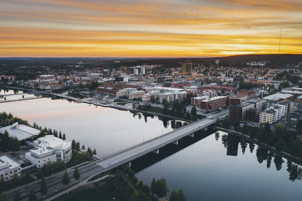 A river with a city in the background — Swedish Lapland, Sweden