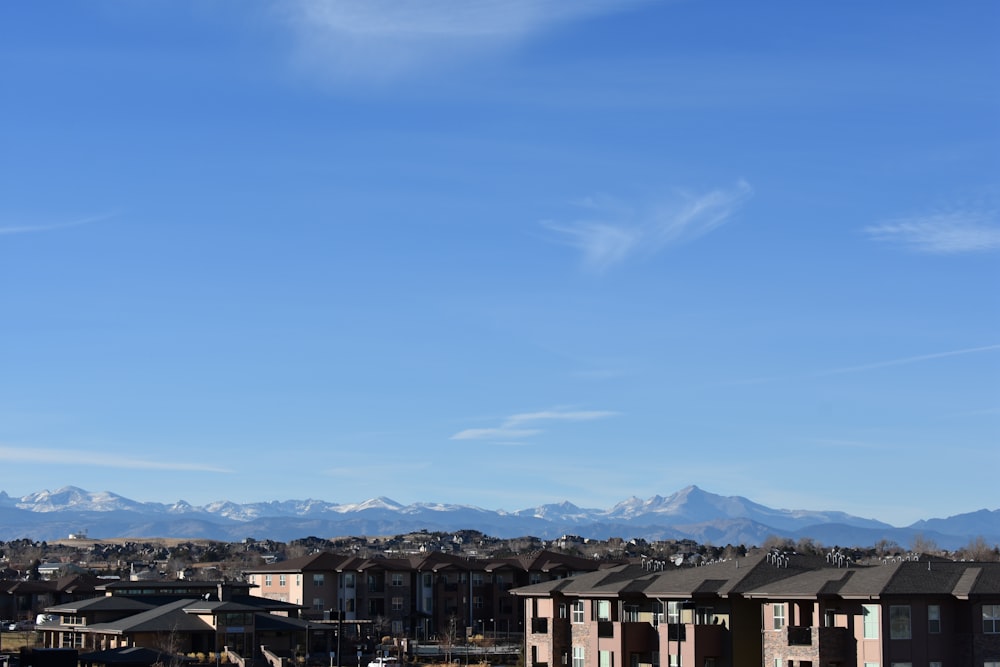 a city with mountains in the background