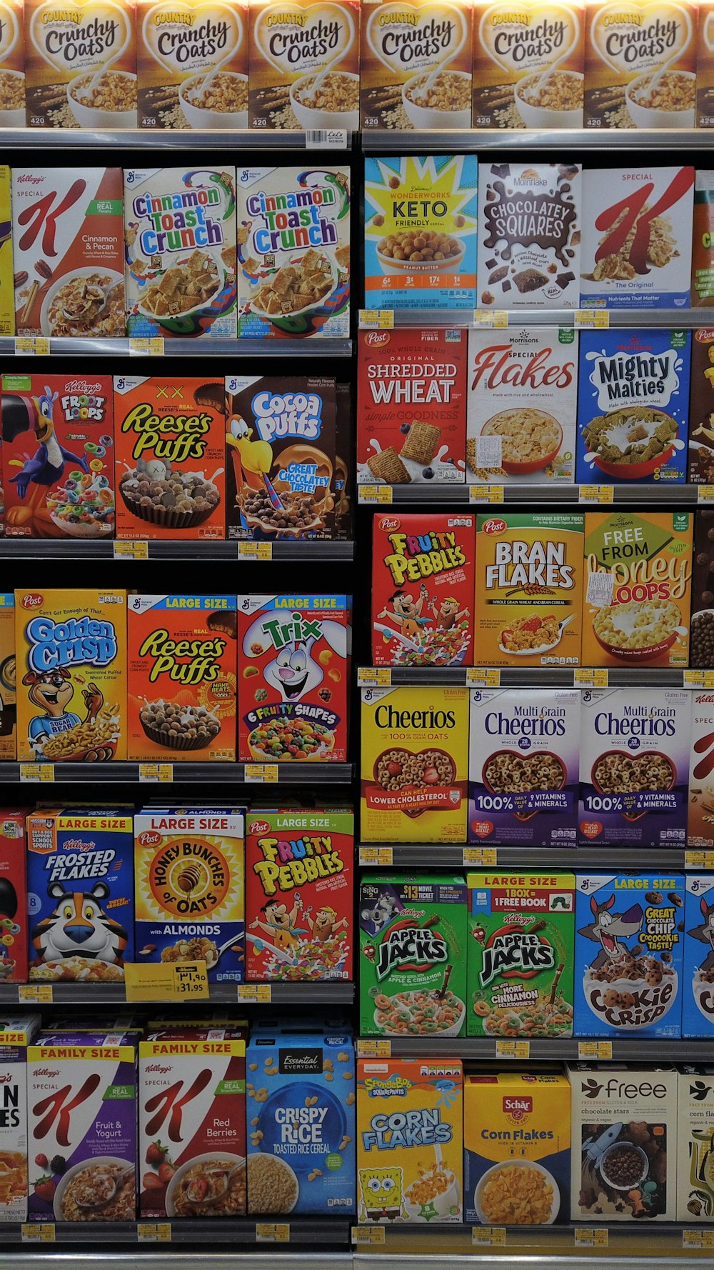 a shelf of cereal boxes