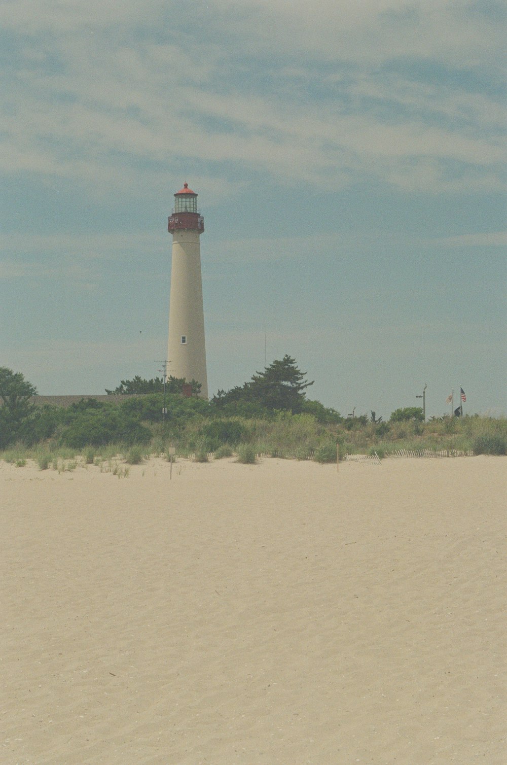 a lighthouse on a beach