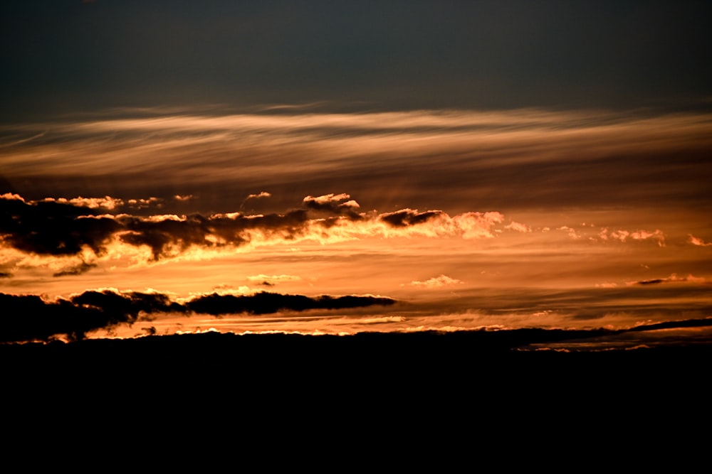 a sunset over a body of water