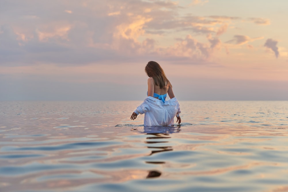 a person sitting in water