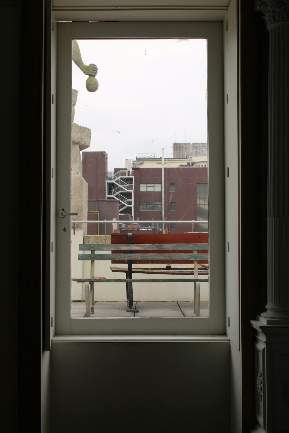 a window with a view of a city