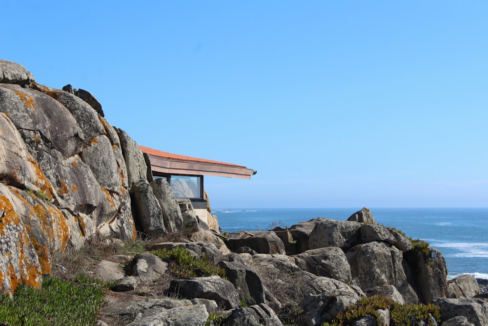 a bridge over a rocky beach