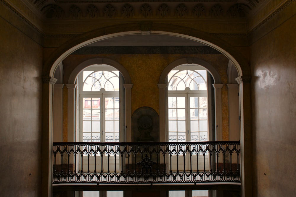 a balcony with a statue on it