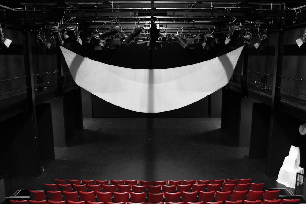 a stage with a white banner